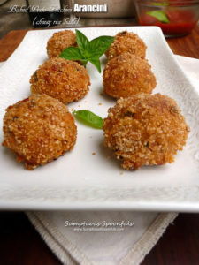 Baked Pesto Zucchini Arancini ~ Sumptuous Spoonfuls #leftover #rice #zucchini #recipe