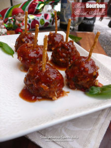 Maple Bourbon Cocktail Meatballs ~ Perfect for your holiday parties, these meatballs are swimming in a sweet maple bourbon sauce that everyone will love!